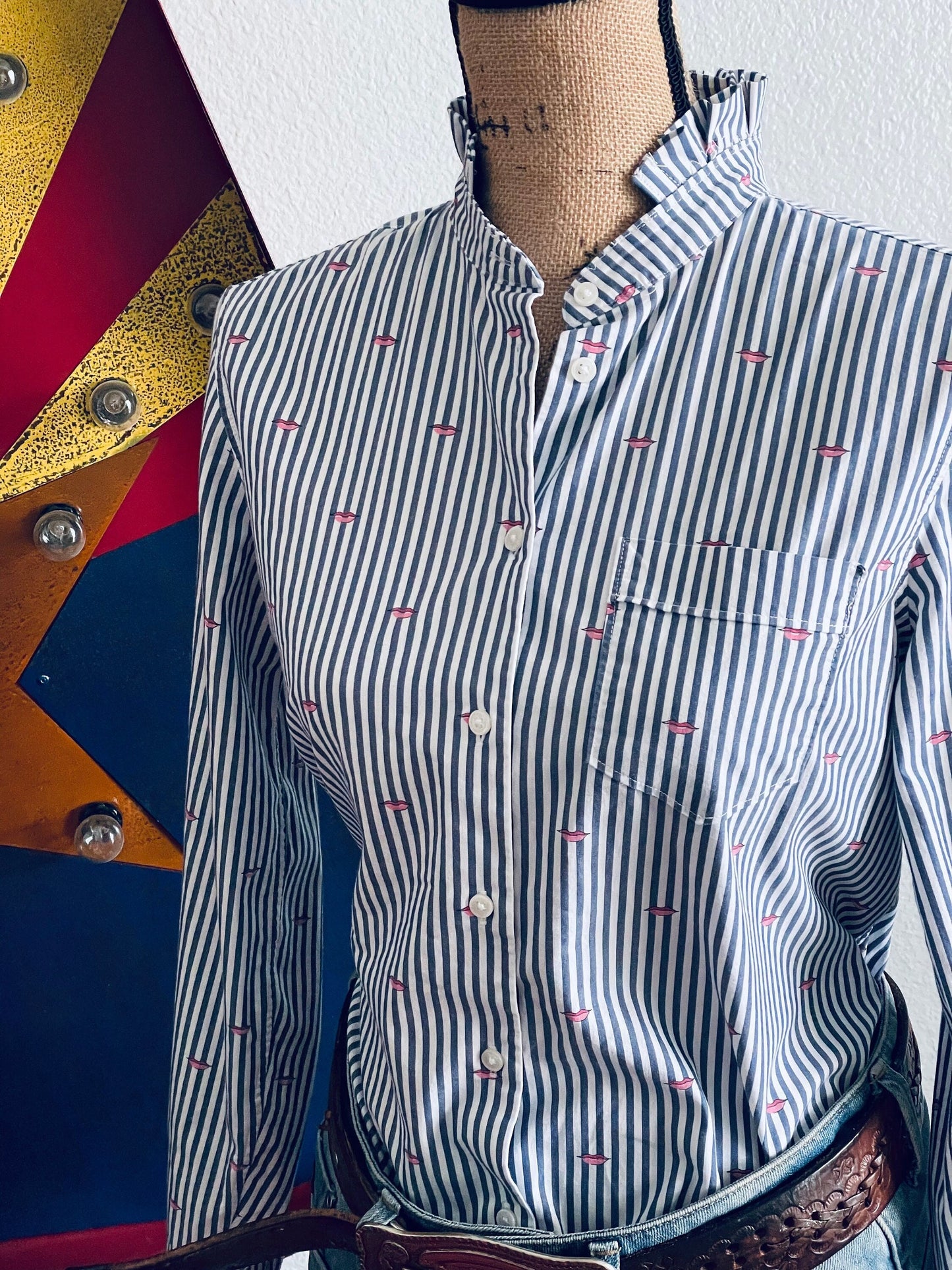 Just in time forValentine's Day.  Blue and white striped long sleeve ruffle collar button down